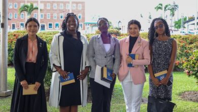 Photo of Young women engage CARICOM officials as part of “Diplomat for a Day” initiative