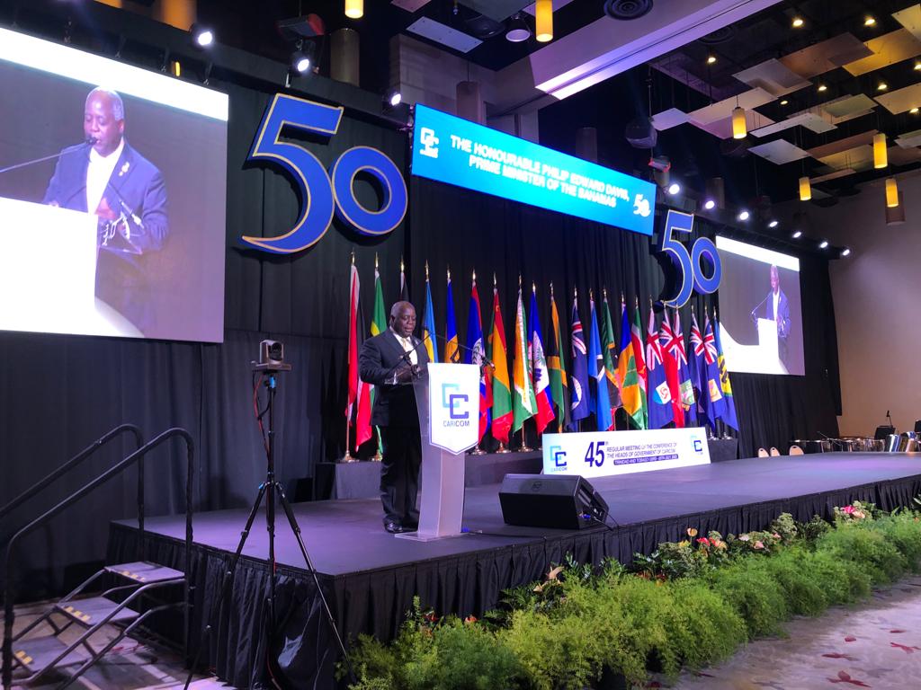 Outgoing CARICOM Chairman, PM Of The Bahamas, the Hon. Philip Davis addresses the opening of the 45th Meeting of the CARICOM Heads of Government in Trinidad and Tobago