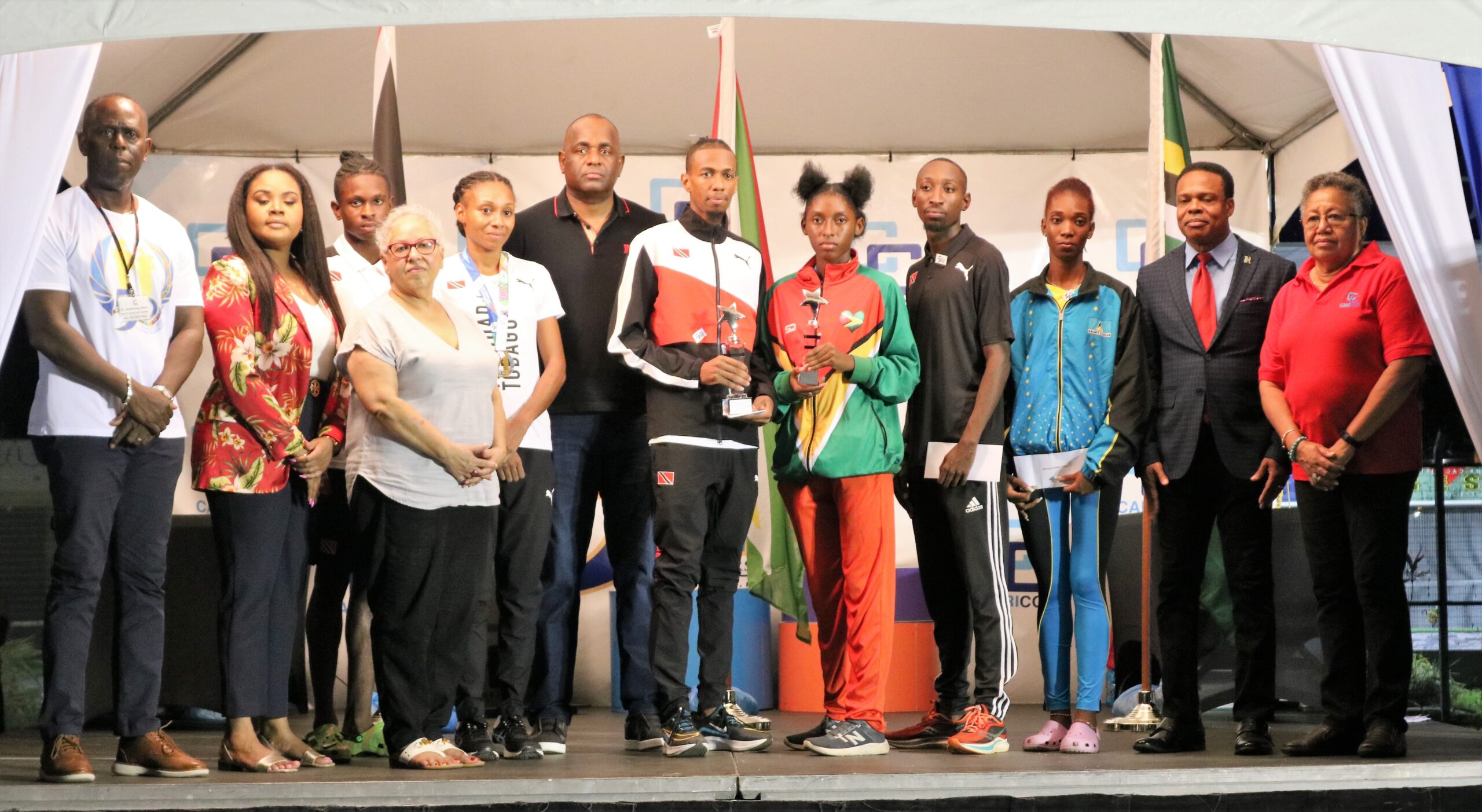 Winners of the CARICOM Road Races pose with CARICOM Chair, Government Ministers of Trinidad and Tobago, CARICOM SG and other officials