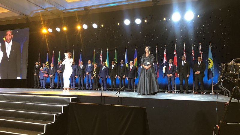 ‘Sing of your Caribbean pride’ – Bahamian singer, Wendi (in white) performing the CARICOM Song at the opening of the 44th ARICOM heads of Government Conference in The Bahamas