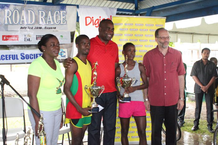 Photo of Guyana, SVG win male, female CARICOM 10k title