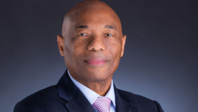 Photo of Dr. Gene Leon takes office as CDB President