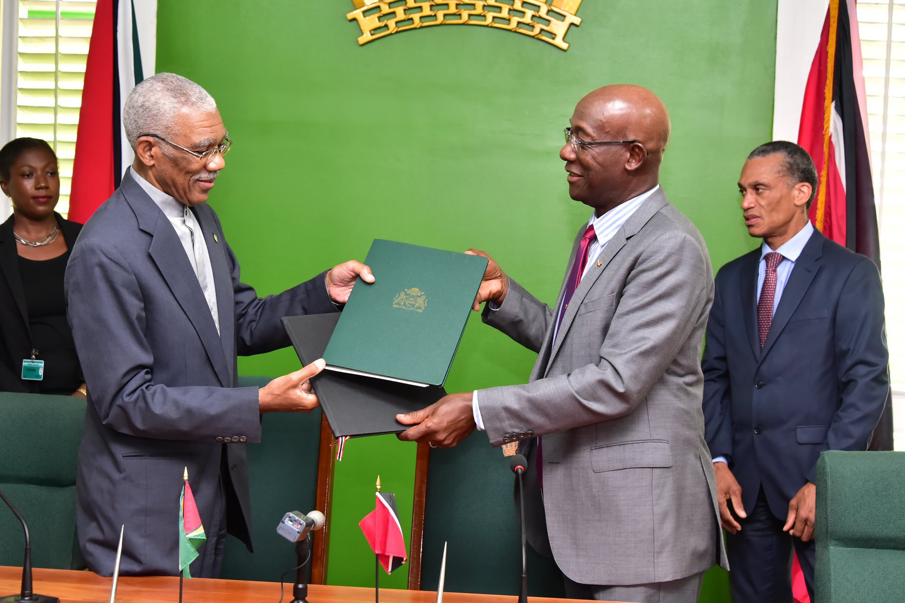 Photo of Prime Minister Rowley and President Granger Sign Energy MOU