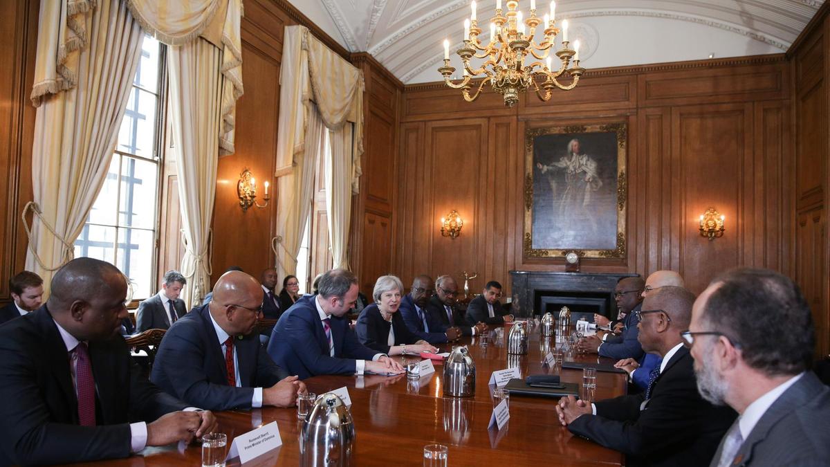 Photo of PM Harris says apologies by UK PM Theresa May and Home Secretary Amber Rudd  mark the start of the dialogue on the WindRush Matter