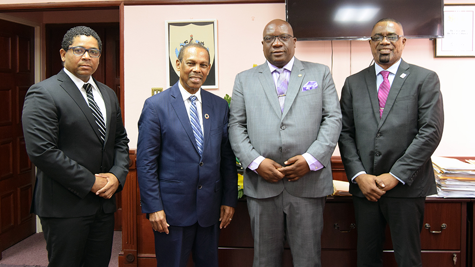 Photo of Prime Minister Harris and regional health leaders discuss critical issues relating to the HIV/AIDS Agenda