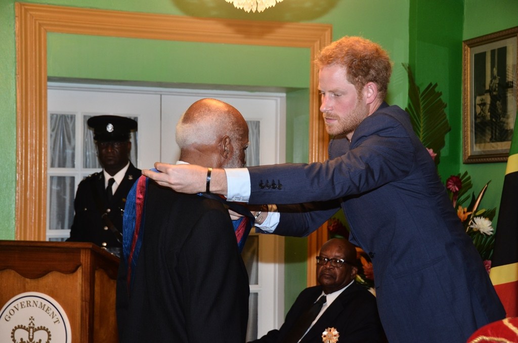 Photo of Former Governor-General receives knighthood from Prince Harry