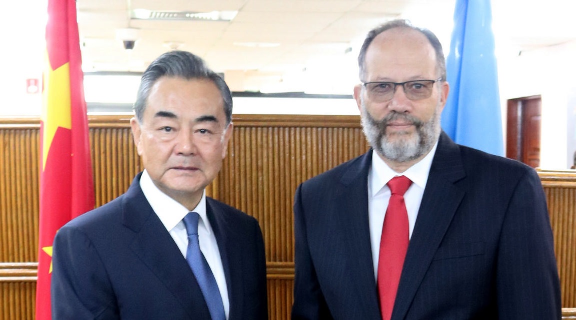 Photo of CARICOM Secretary-General Ambassador Irwin LaRocque and State Councilor HE Wang Yi, Foreign Minister of China, greet before their discussions at CARICOM Secretariat Headquarters in Georgetown, Guyana, Saturday 22 September, 2018.